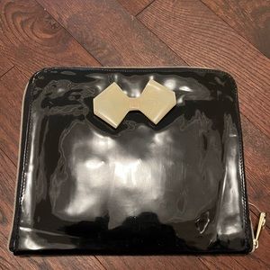 Black iPad case with white bow